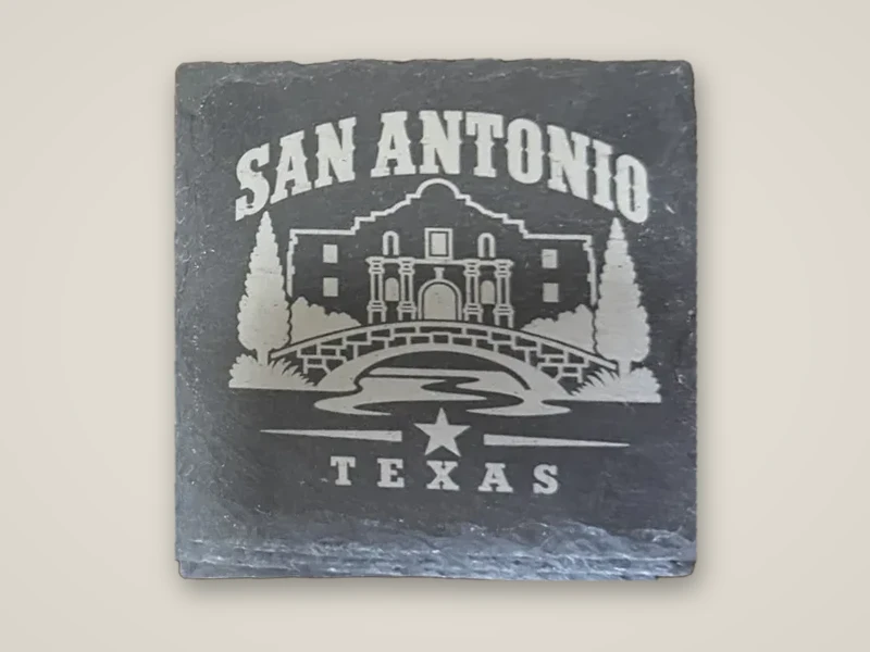 Slate coaster engraved with San Antonio, Texas, the Alamo and the river bridge